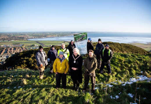 The Mayor of Ards and North Down, Councillor Karen Douglas with Council staff, National Trust, South Eastern Regional College (SERC) and local volunteers  who recently  worked to upgrade the Scrabo habitat for the local lizard population.